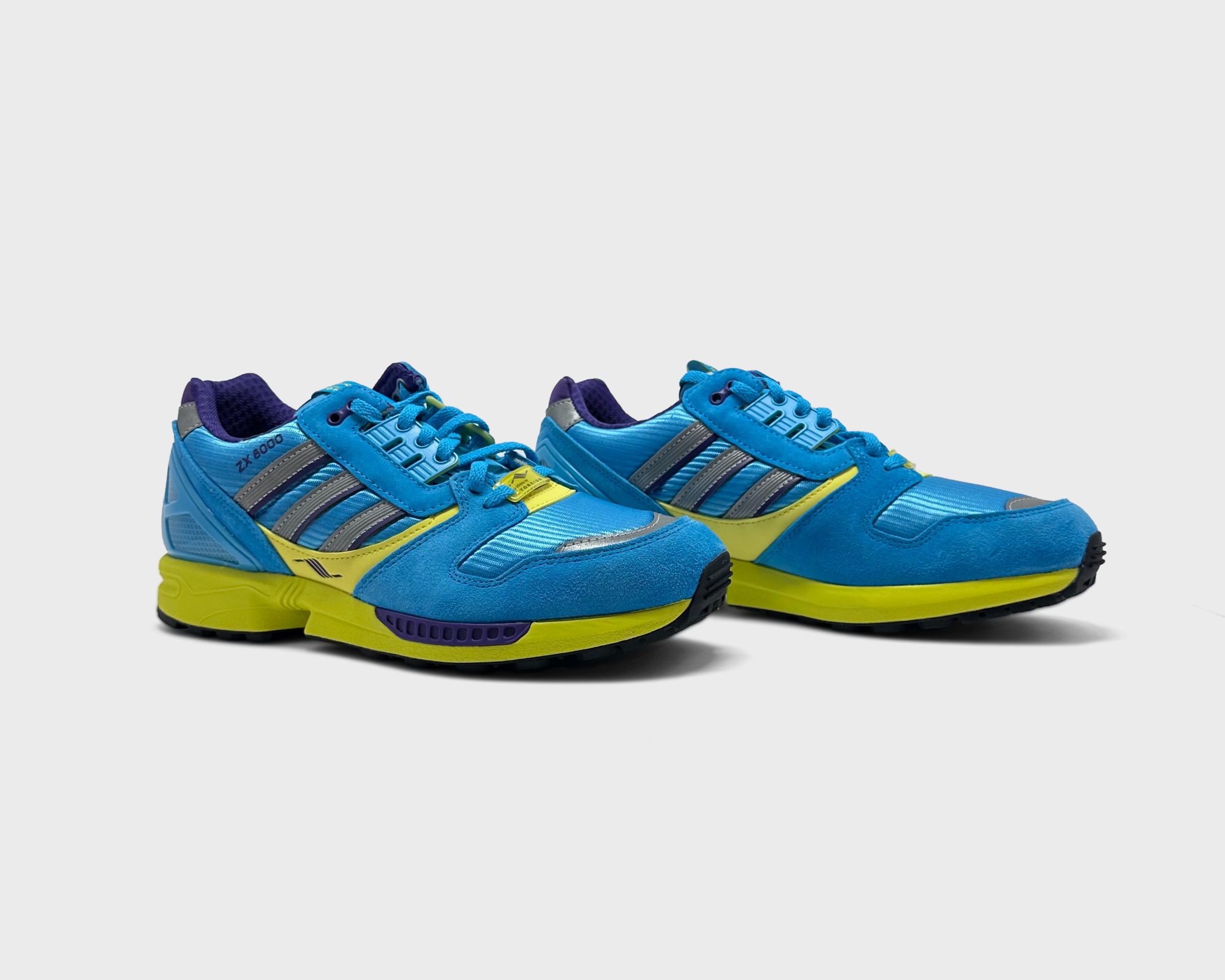 Adidas ZX8000 Blue Green Sneaker blau grün Paar schräg von vorne
