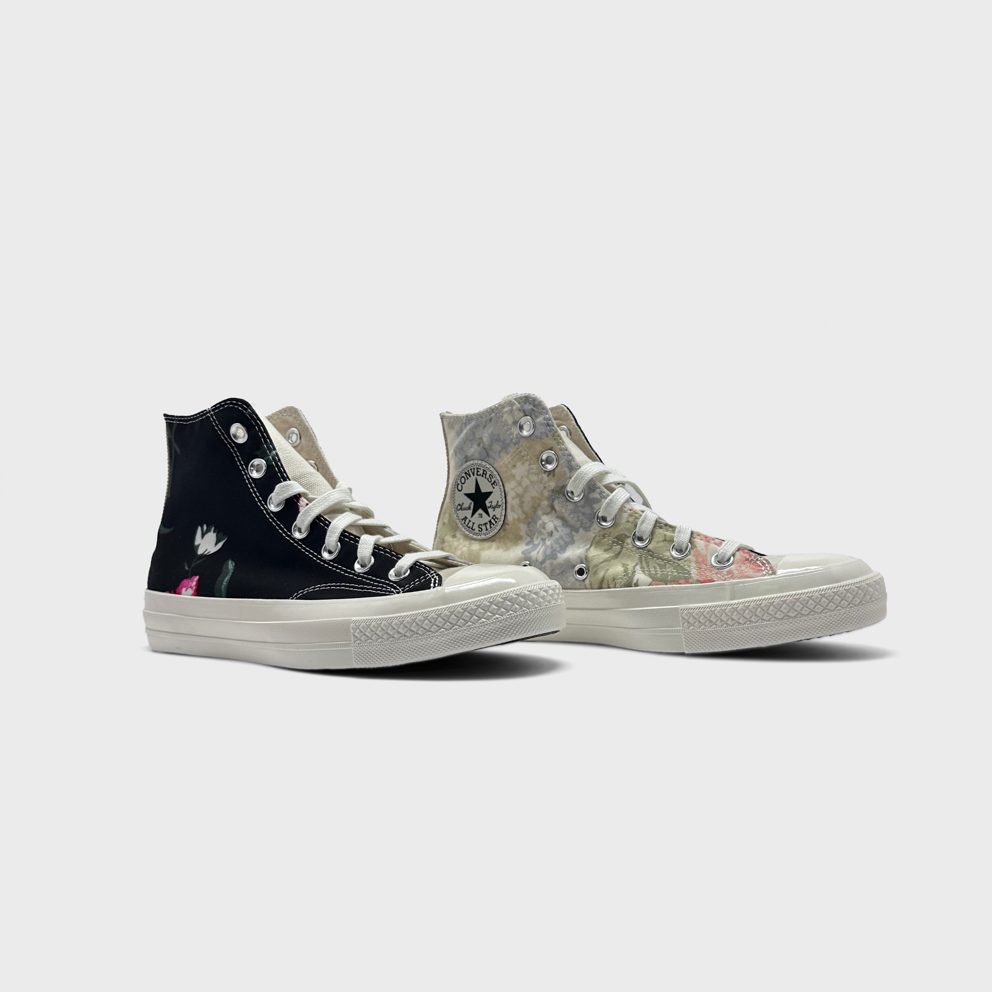 Converse Chuck Taylor All Star Hi Black Floral Sneaker schwarz floral Paar schräg von vorne
