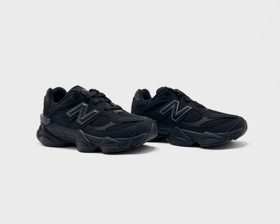 New Balance 9060 Black Kids Sneaker schwarz Paar schräg von vorne
