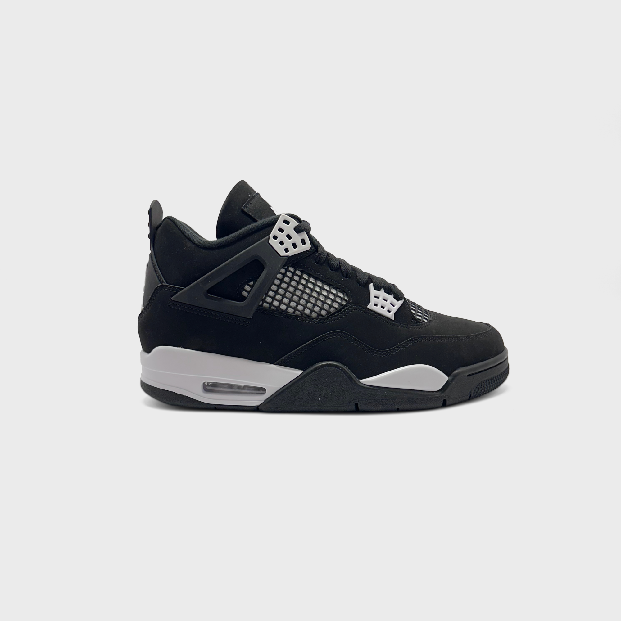 Nike Air Jordan 4 Retro White Thunder Sneaker schwarz weiß Außenseite Seitenansicht
