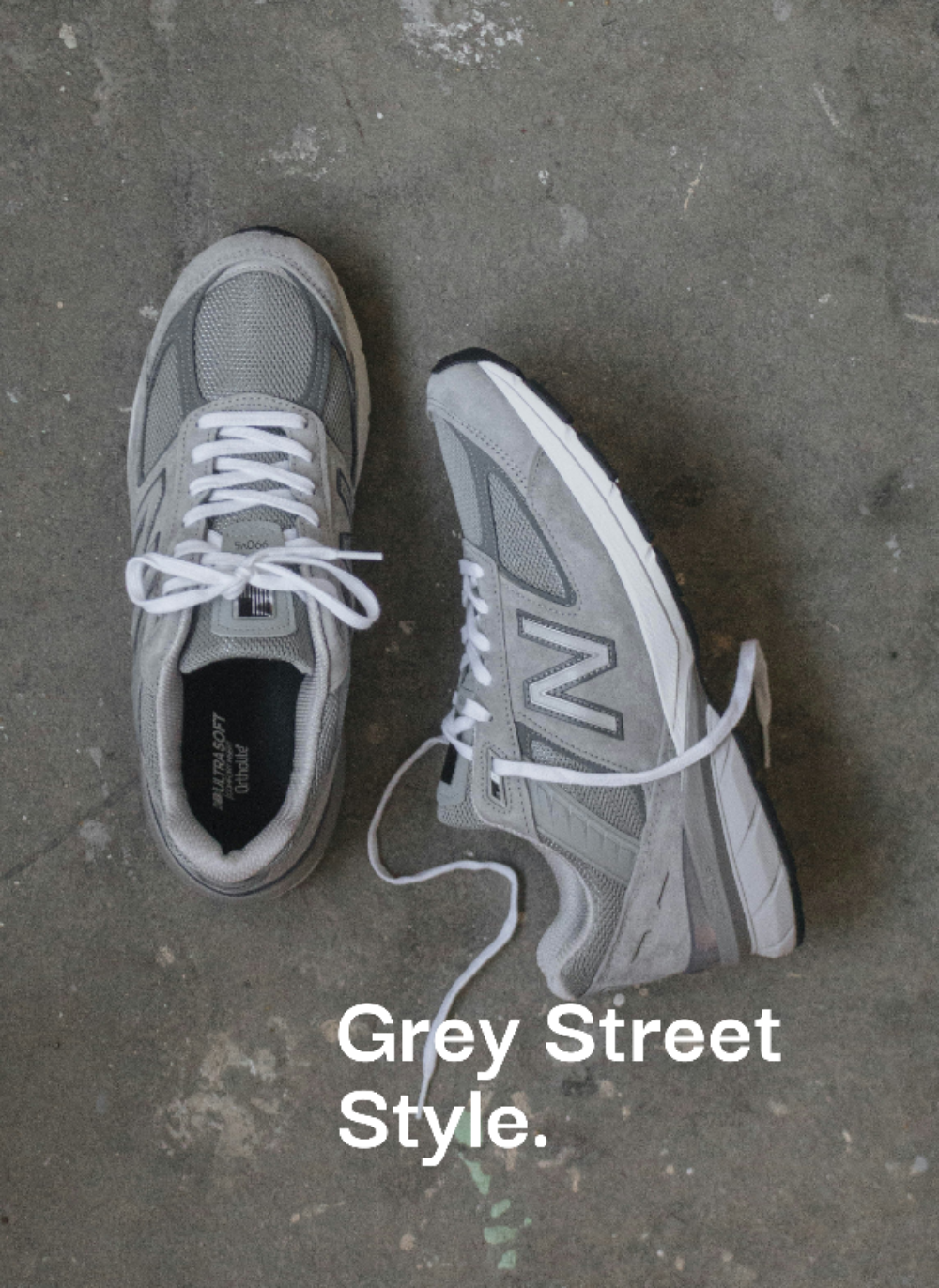 Grey Street Style bei sneekrs mit grauen New Balance Sneakern auf Betonboden