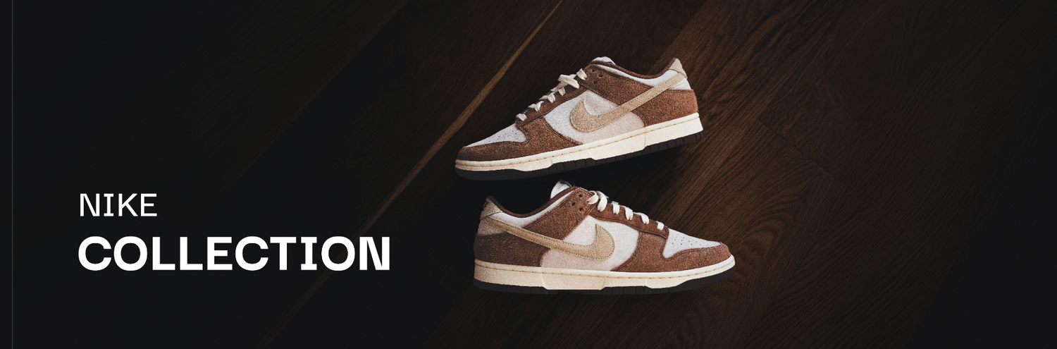 Braune Nike Sneaker auf dunklem Holzboden in der soleone Collection